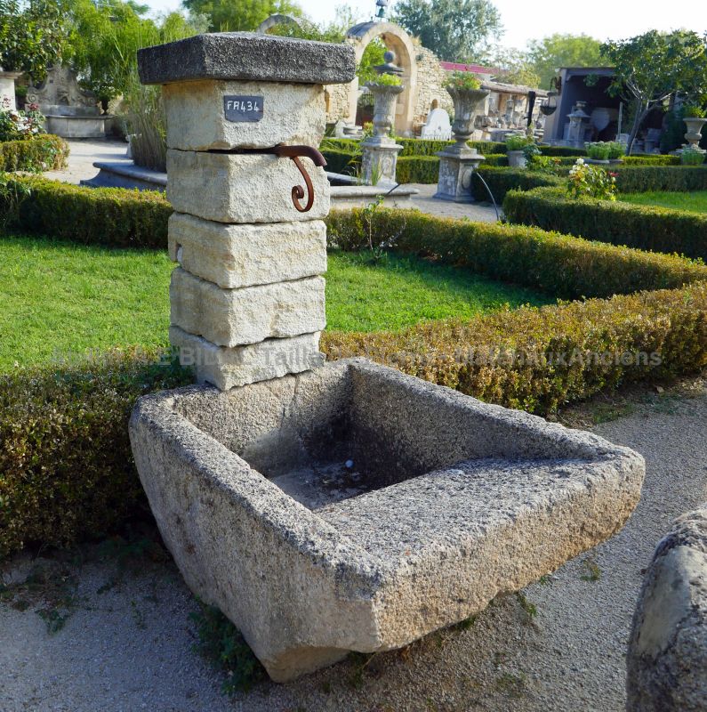 Ancient fountain of Provence in natural stone by Alain Bidal Antique Materials in Provence.