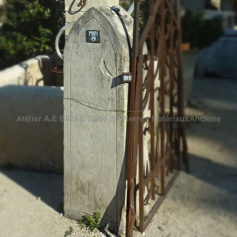 Beautiful pillar set in situation with an old wrought iron gate.