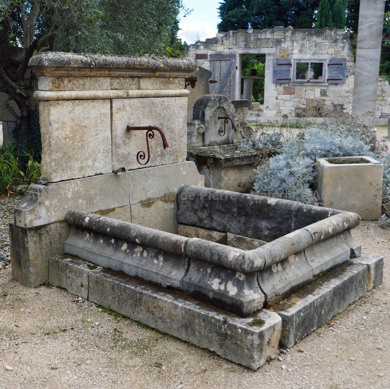 Antique fountain in stone by Alain BIDAL Antique Materials in Provence.