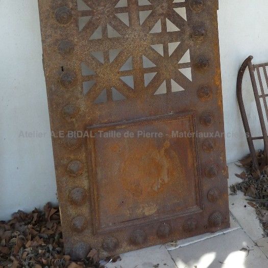 Semi- openwork old chapel door.