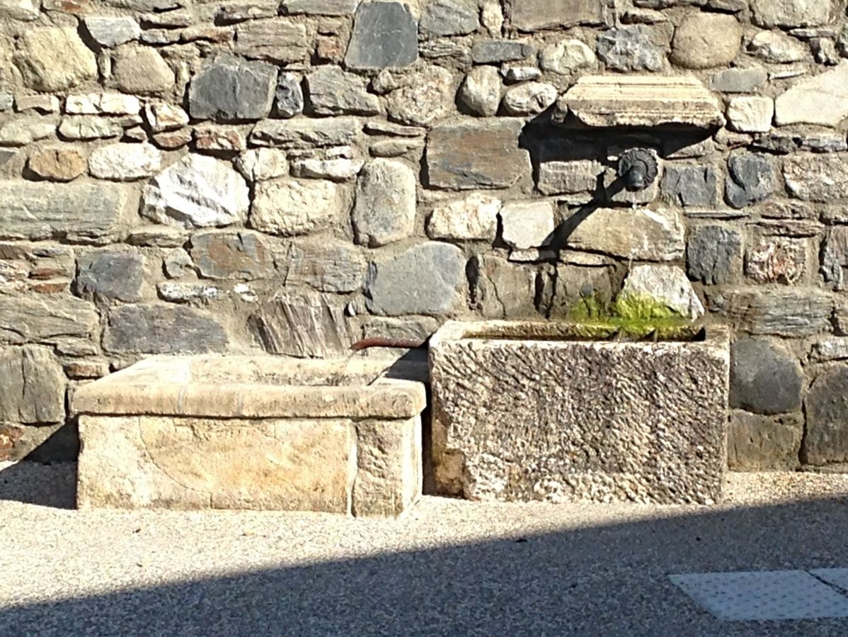 Superb garden fountain signed AE Bidal made of antique stones..