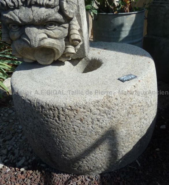 Meule ancienne en granit