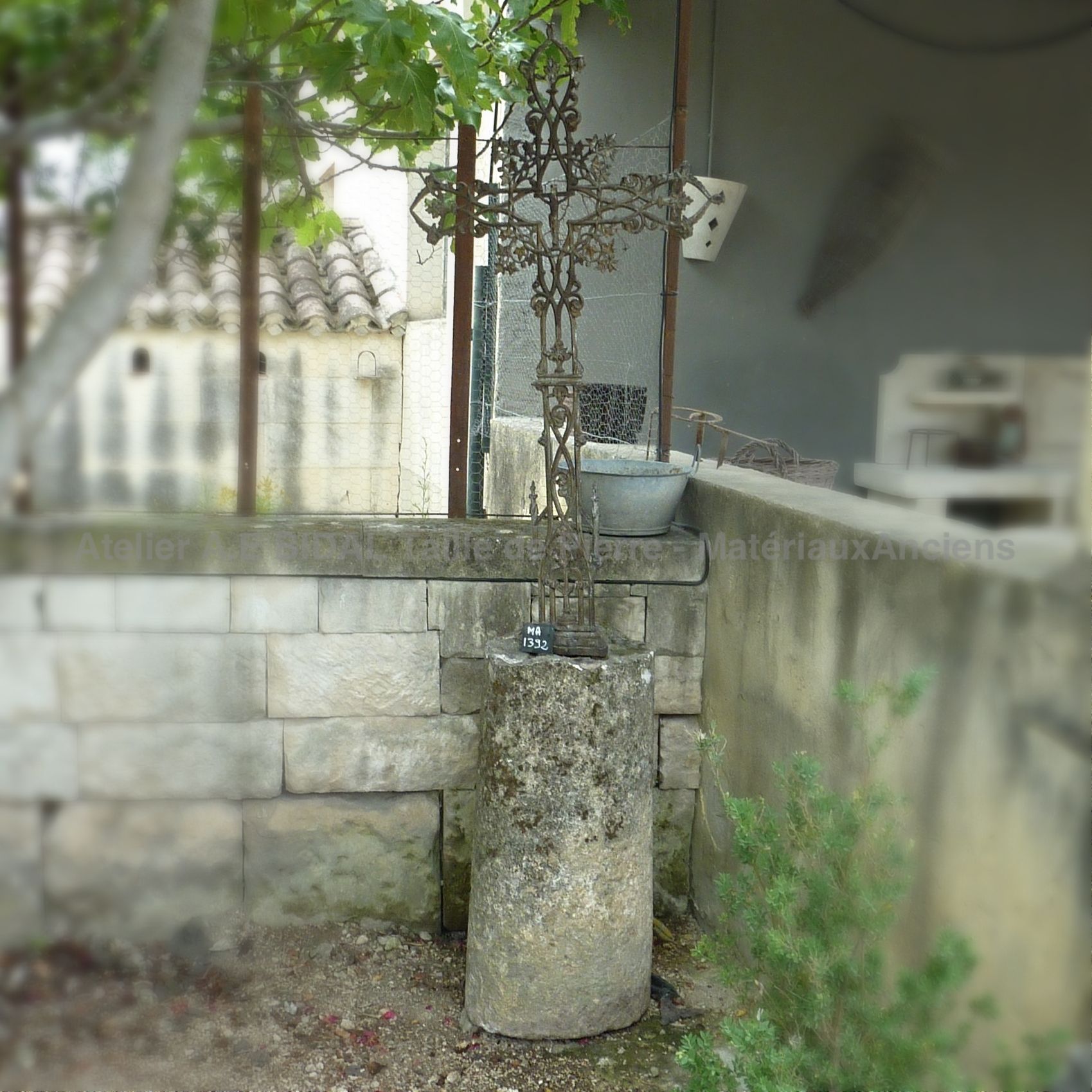 Superb wrought iron cross with a Christ in its center - old cross.