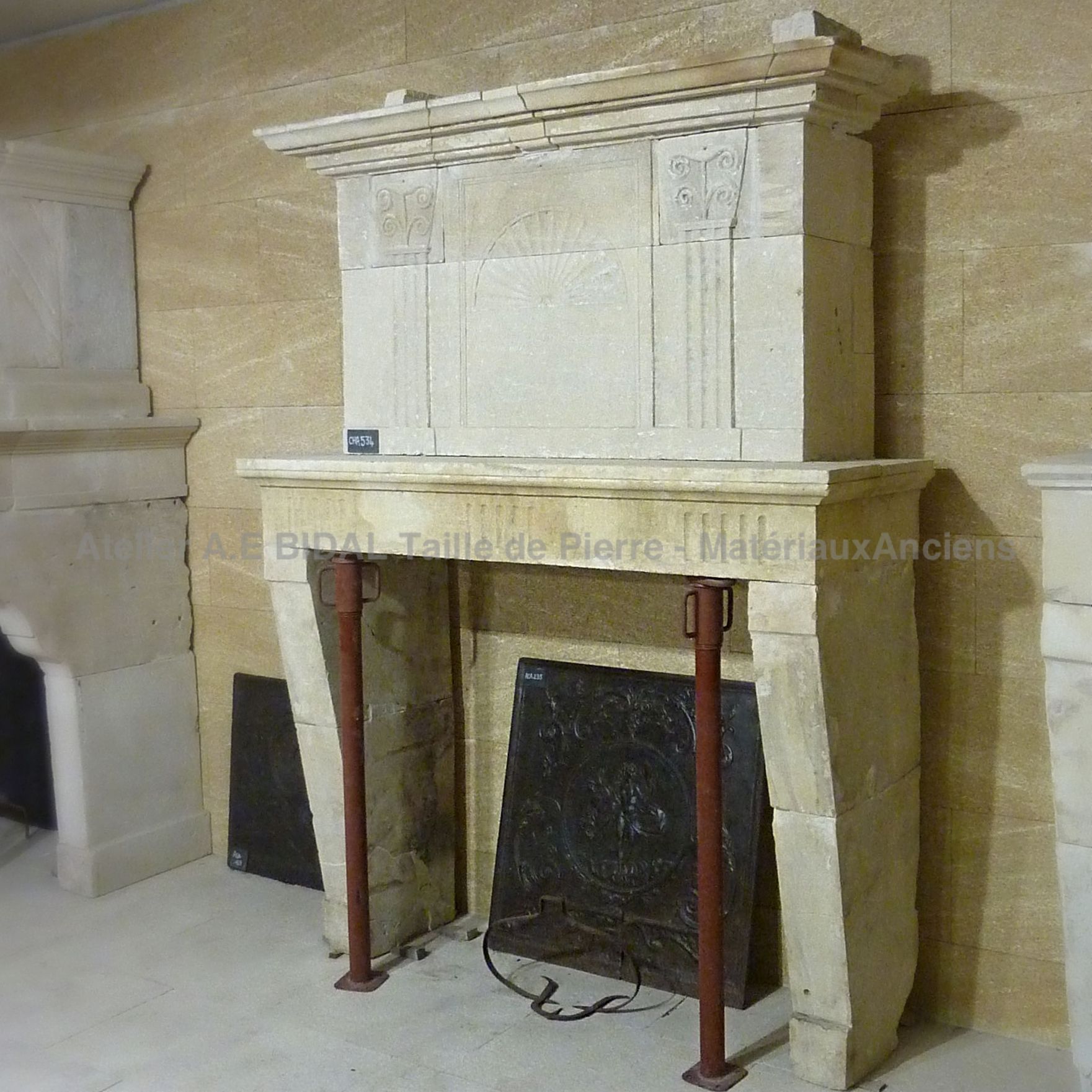 Antique Louis 16 stone fireplace - A beautiful fireplace with a nice stone trumeau.