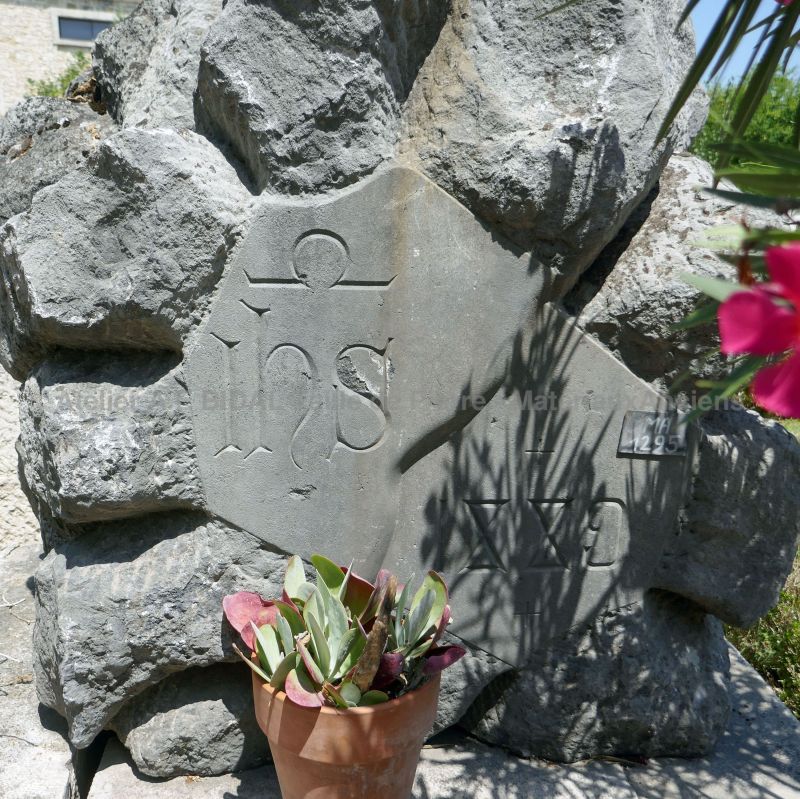 Foot of the stone cross - an old cross supported by two bases made of authentic stone.