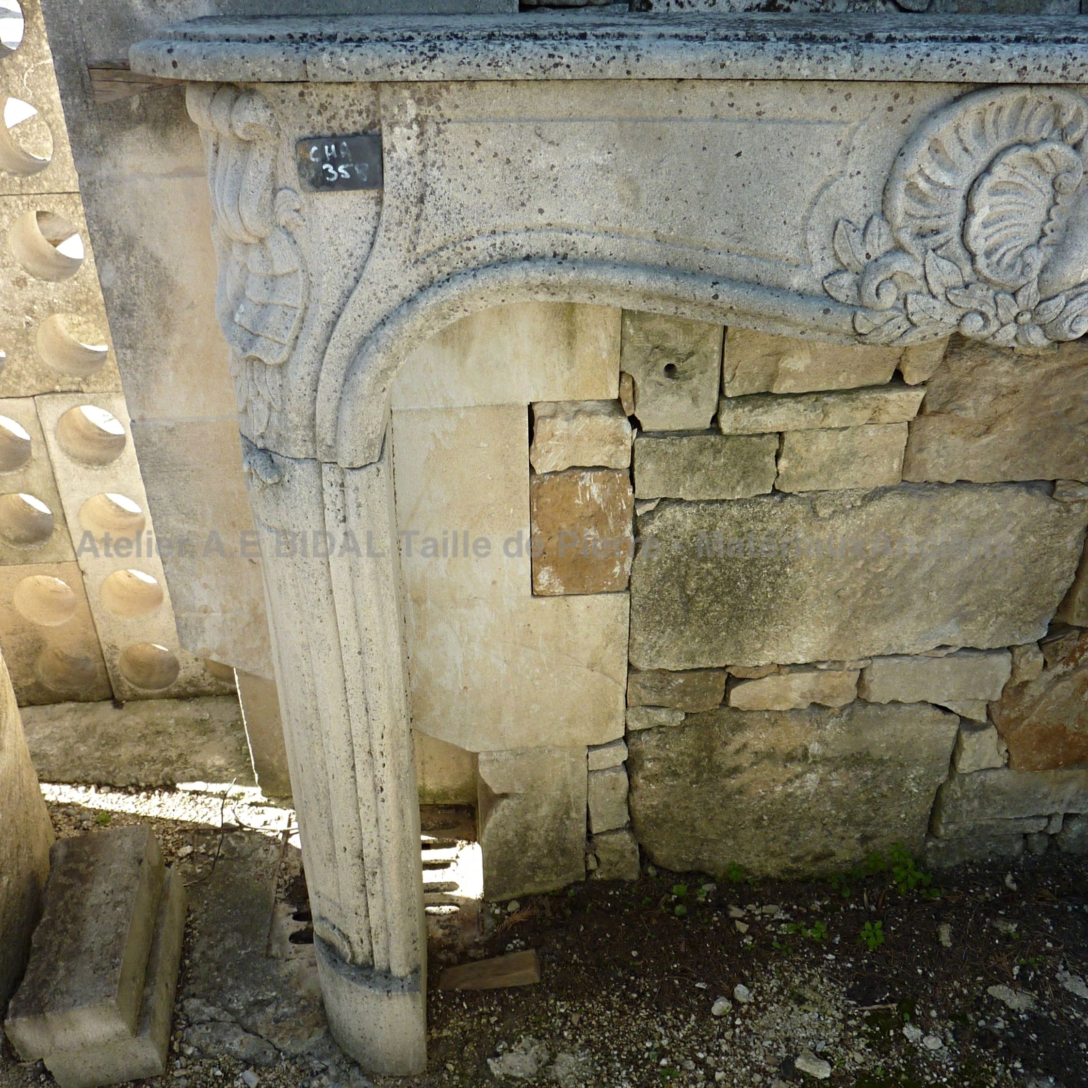Old decorated  fireplace- a fireplace made of Savonnière stone.