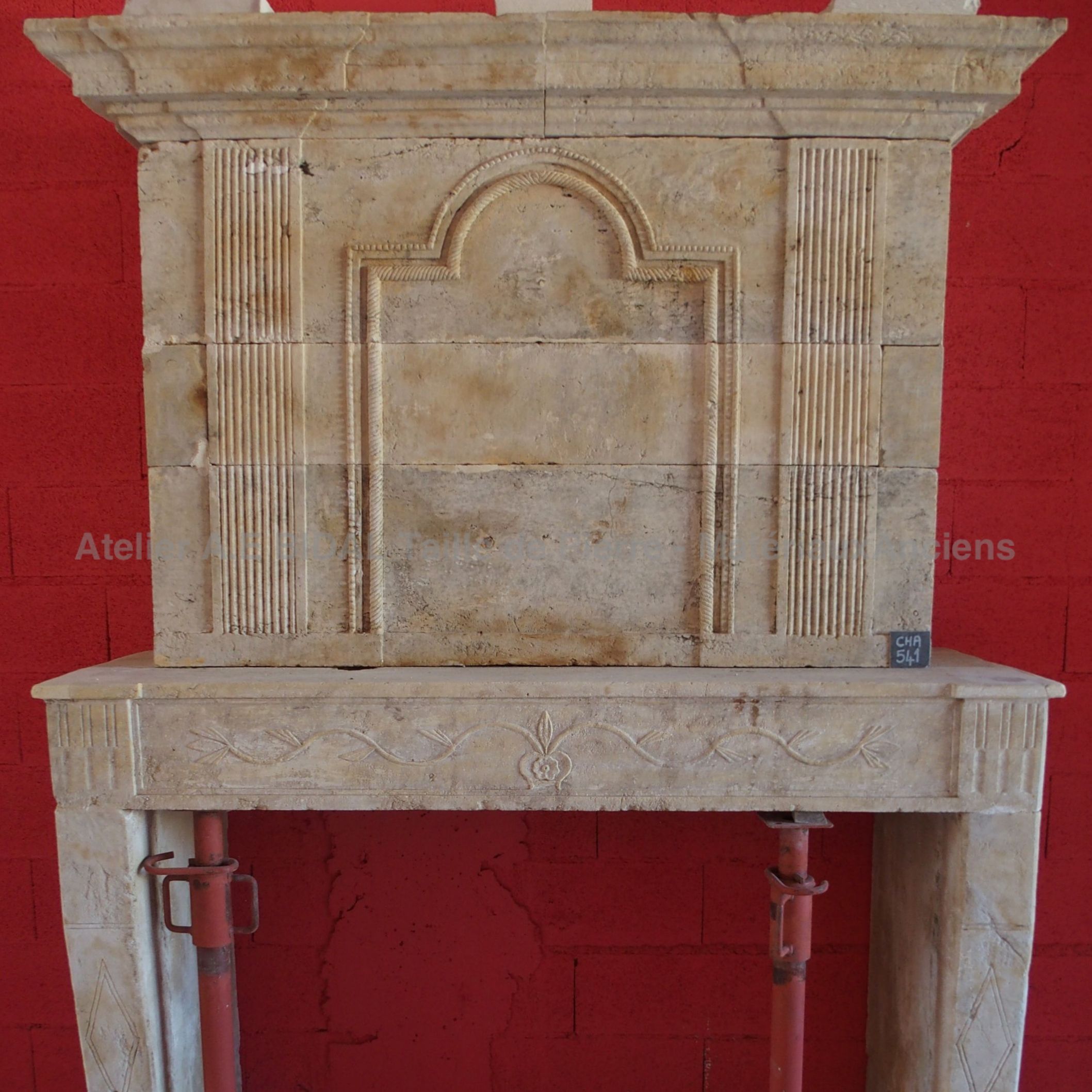 Fireplace with overmantle - old stone fireplace.
