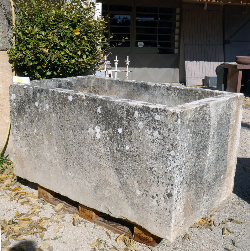 Large old stone trough for sale at Les Matériaux Anciens in Provence Alain BIDAL.