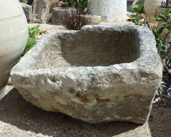 old stone basin - made by stonemason