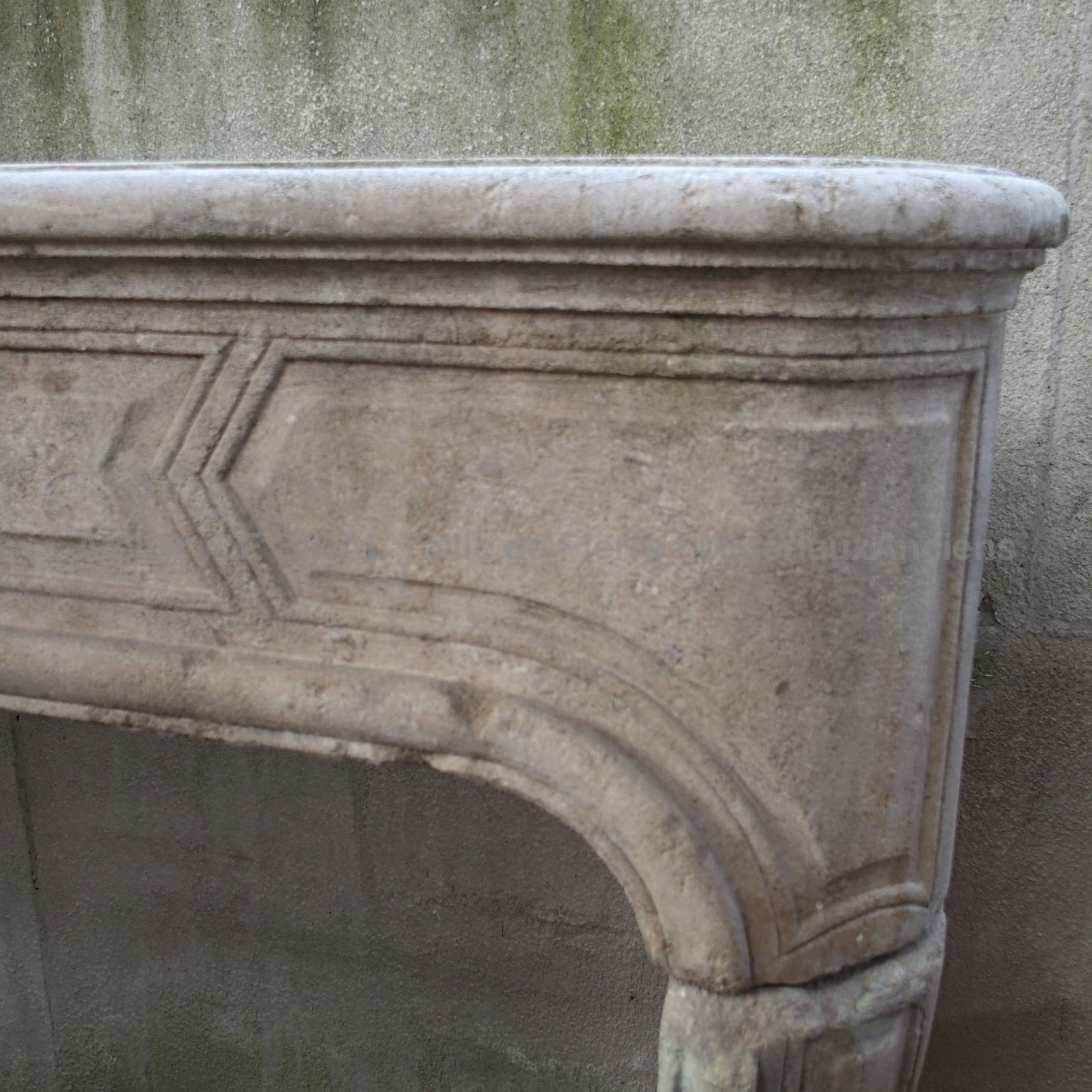 Antique stone fireplace without trumeau - A Louis 15 antique fireplace.