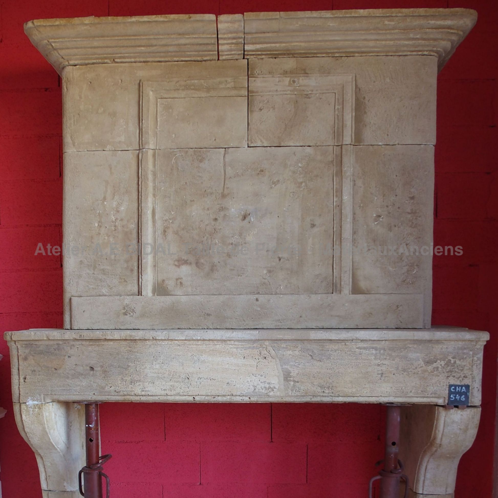 Old fireplace made in France- a fireplace with overmantle inherited from the Louis XIII time.