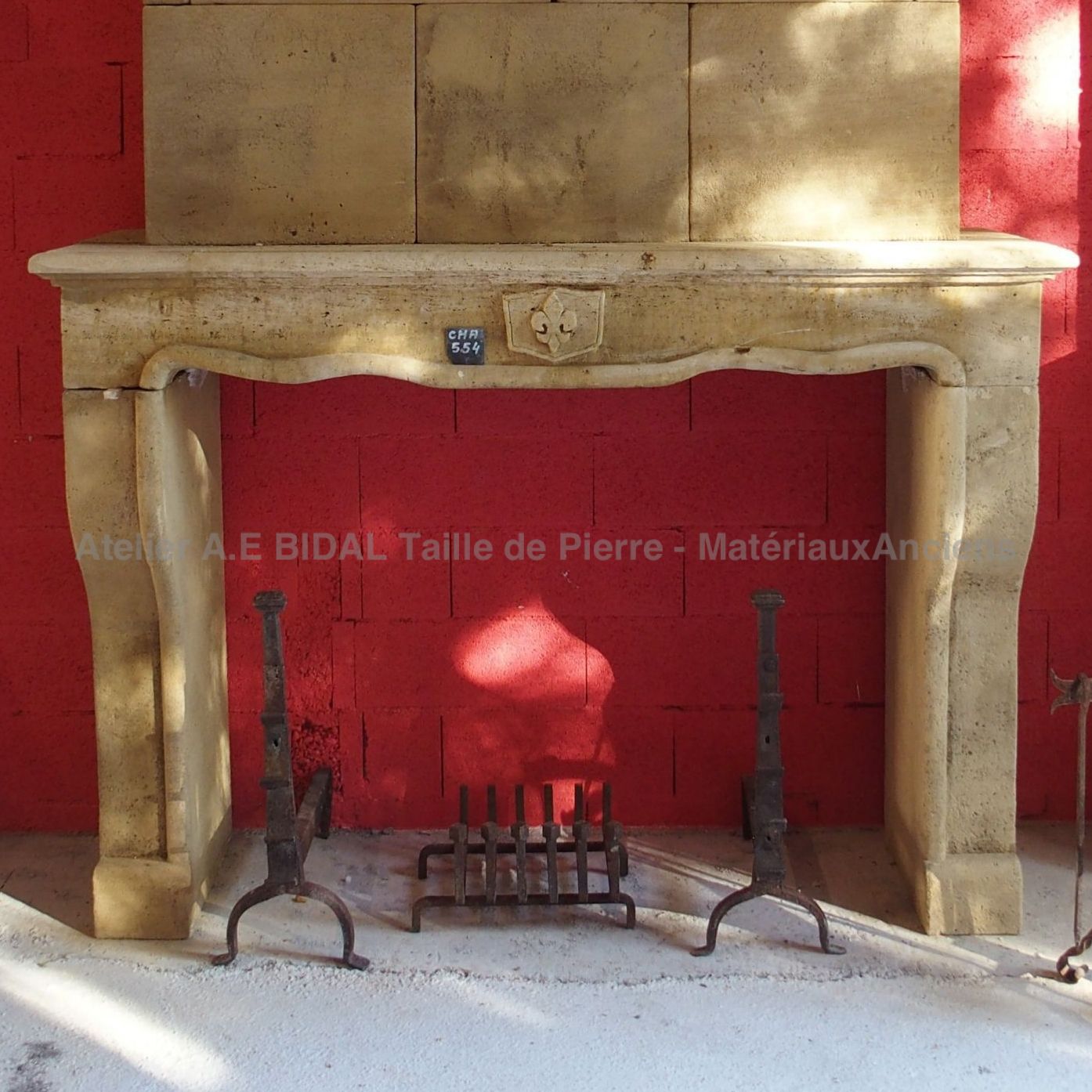 Old fireplace - a stone fireplace that we offer for sale in our catalogue of fireplaces made of old materials.