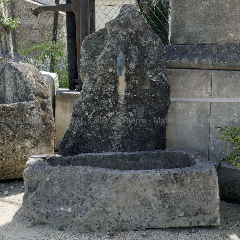 Small fountain / water point - a decorative outdoor fountain.