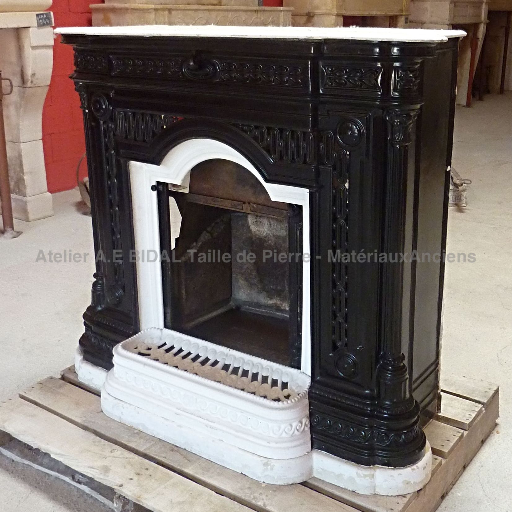 Beautiful old fireplace made of old material: cast iron.