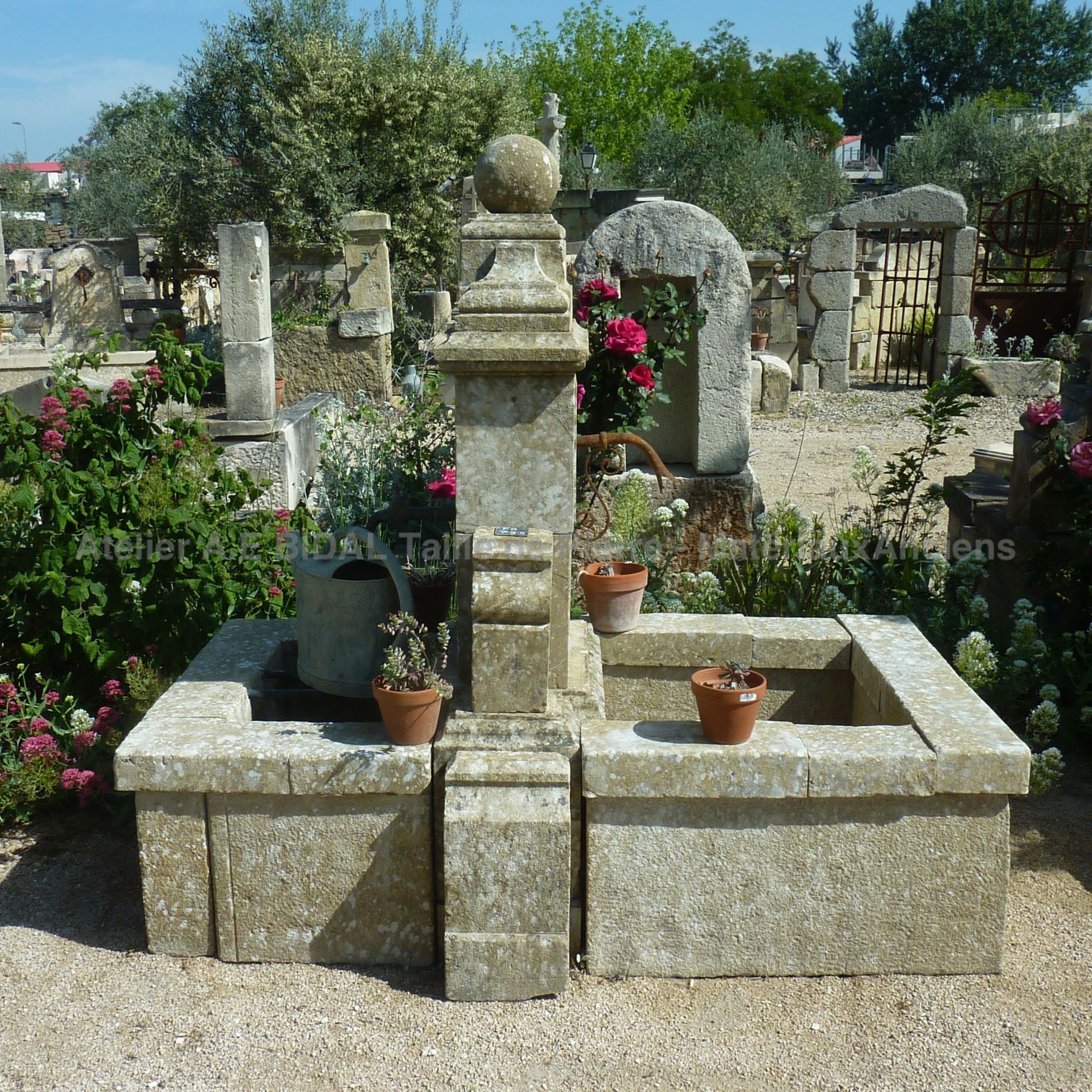 Old stone garden fountain | A large fountain with 2 basins in stone.