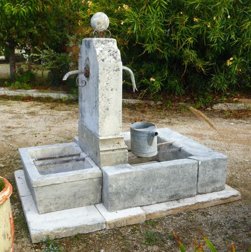 Double-basins fountain in old stone : A garden fountain for sale in Provence
