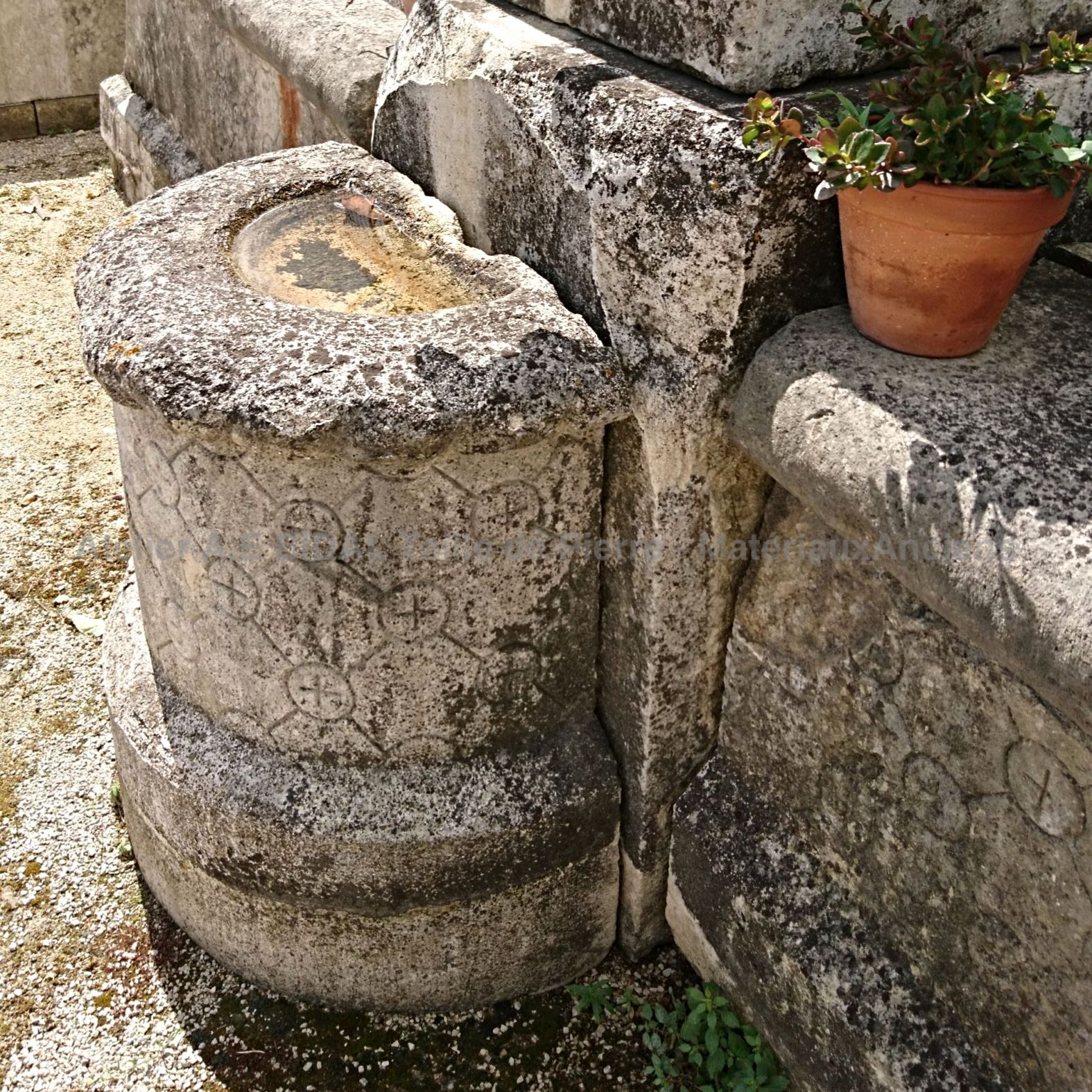 Detail of the small monolithic stone basin on our exceptional 18th Century stone fountain.