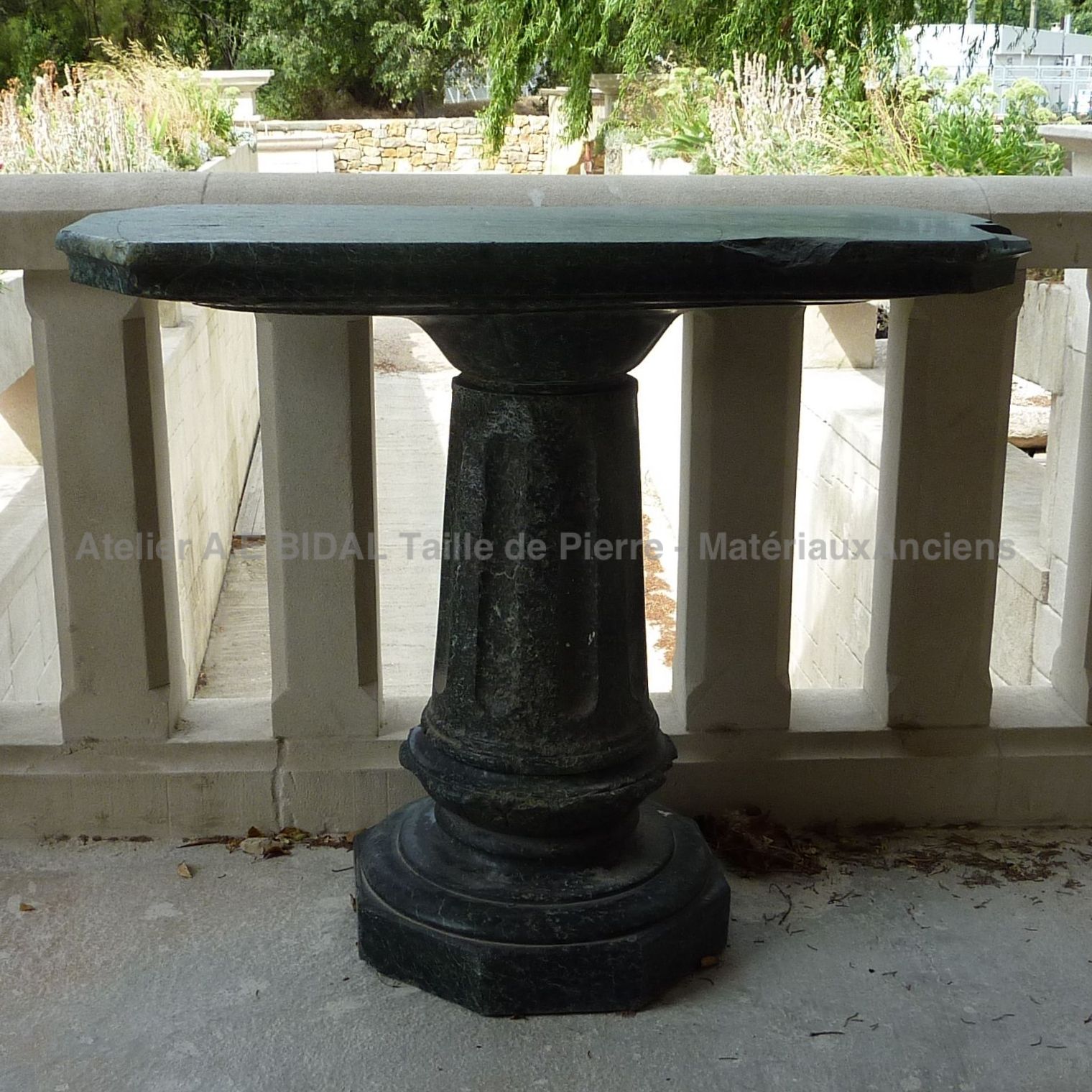 Antique marble table for an old fashionned decoration.