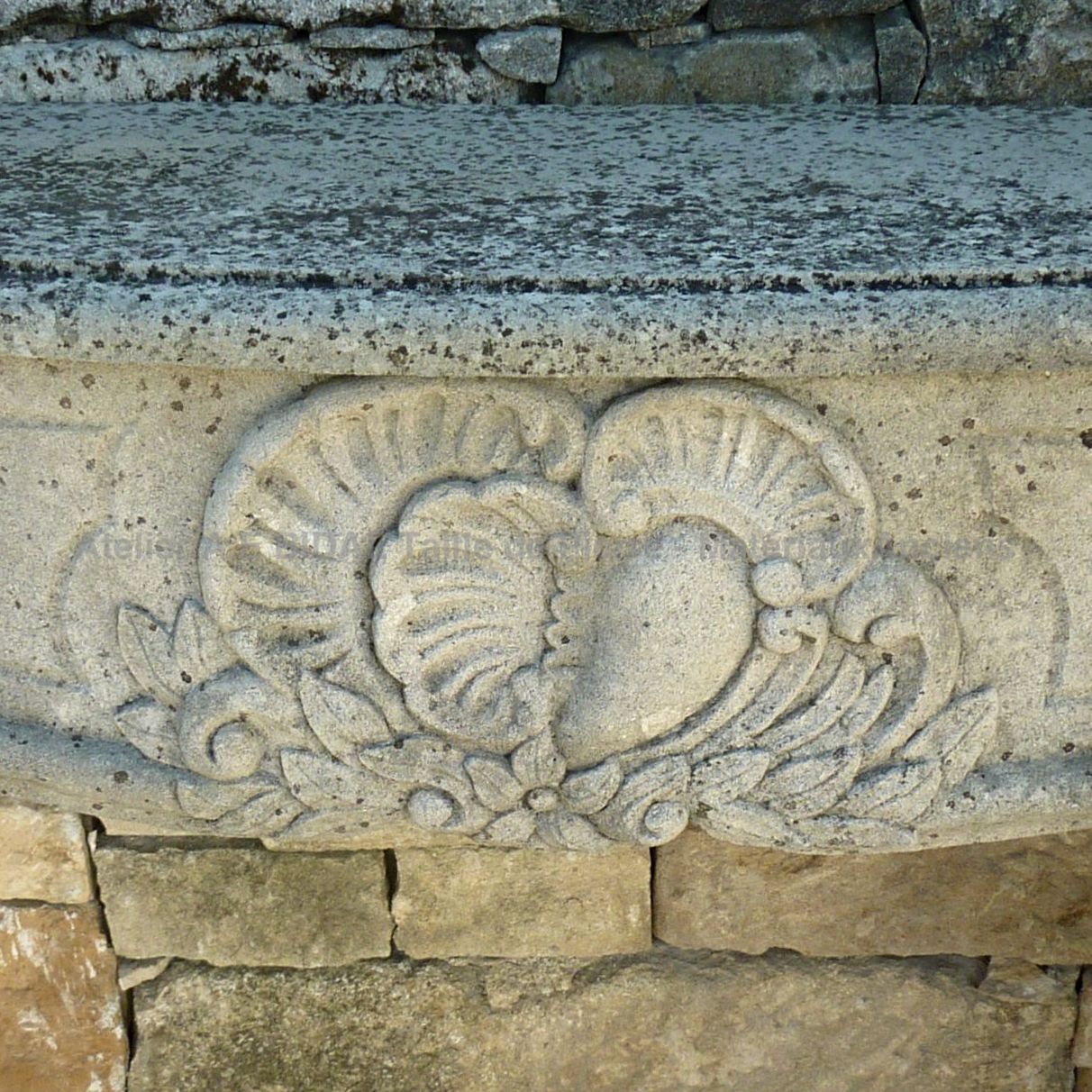 Old fireplace made of Lorraine stone - stone fireplace in a Regency / Louis 15 style.
