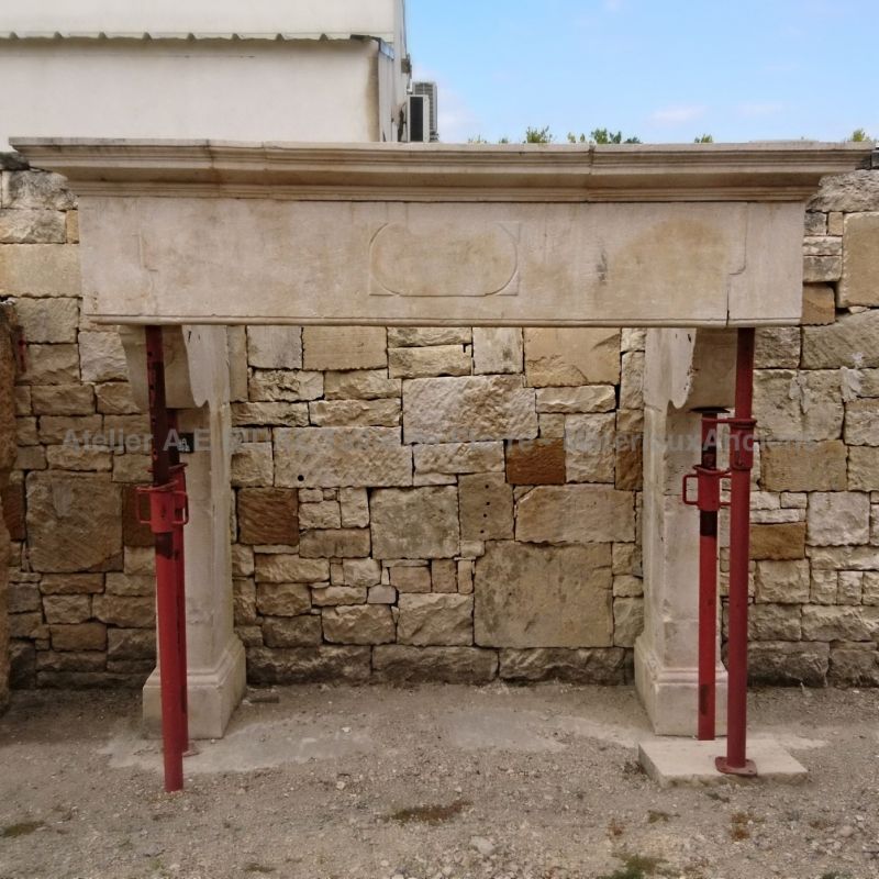 Beautiful antique fireplace- antique stone wedding fireplace with blazon and carved heart.
