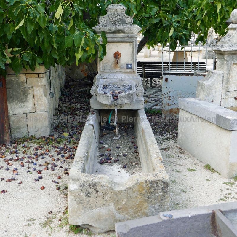 Elegant large fountain made of antique stone and cast iron |  Wall fountain for garden use.