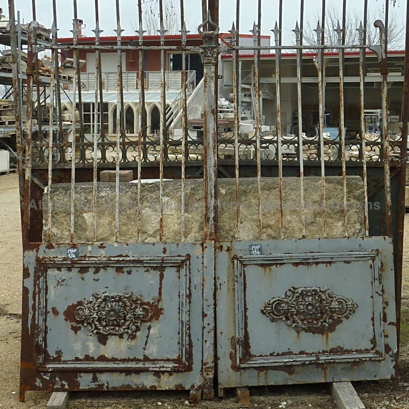 Antique riveted wrought-iron gate with two semi-openwork doors ** SOLD