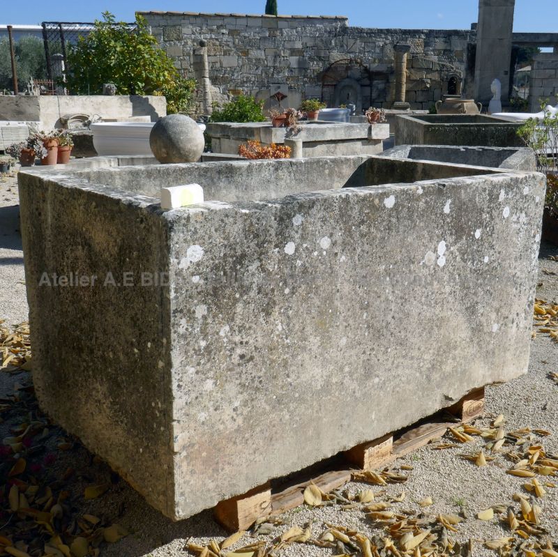 Large old stone trough for outdoors landscaping by Atelier Alain BIDAL