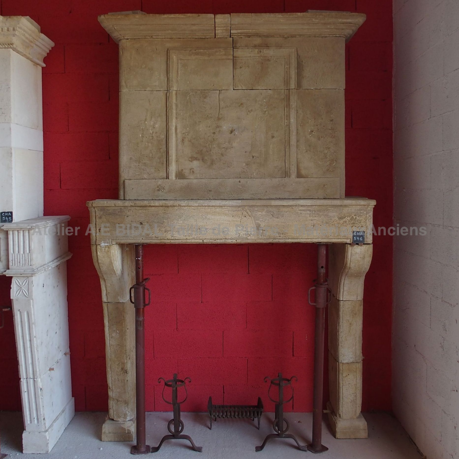Beautiful old fireplace with a simple look - Louis XIII fireplace in a country style.
