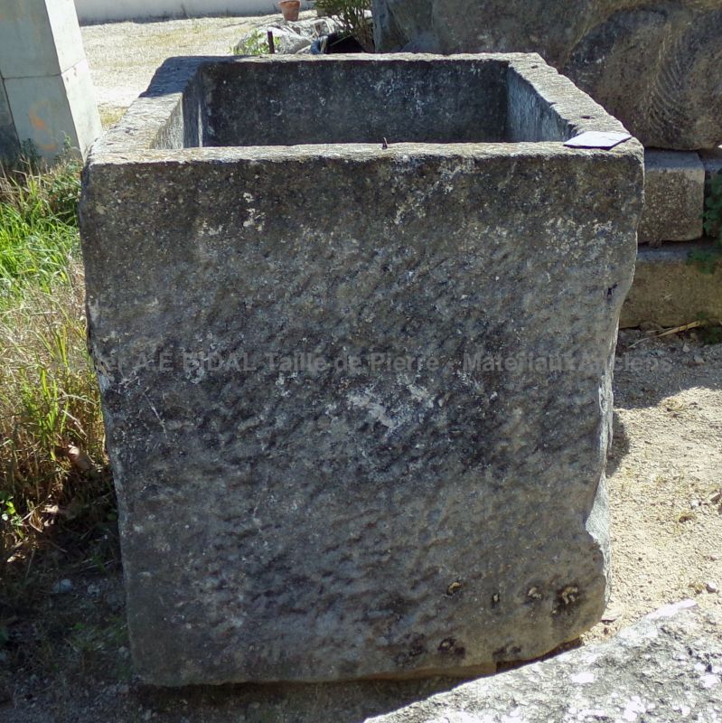 Antique rectangular trough with a rustic appearance