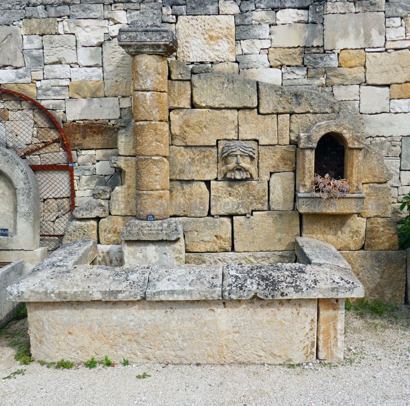 Stone wall fountain - garden fountain with original tray at wall fountain format.