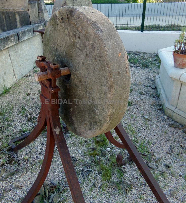 Large old whetstone on a solid wrought iron base by The Antique Materials in Provence Alain BIDAL