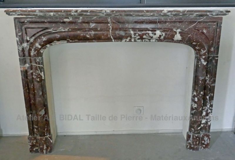 Authentic Louis XIV-style fireplace carved in red marble