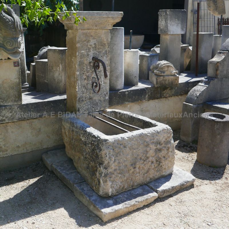 Small wall fountain in old stones by Alain BIDAL Antique Materials in Provence