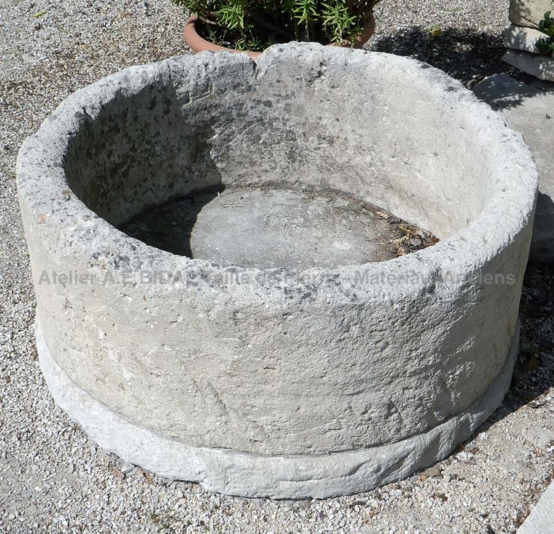 Stone planter ǀ Large round stone trough ǀ One of many stone toughs on sale at BIDAL in Provence!