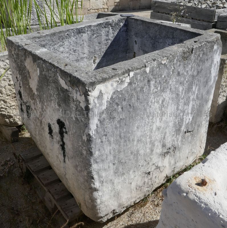 Large and beautiful old square-shaped stone trough.