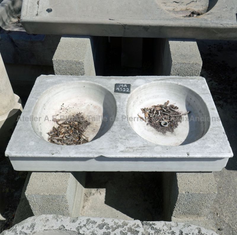 Old sink - an outdoor marble sink with double basin.