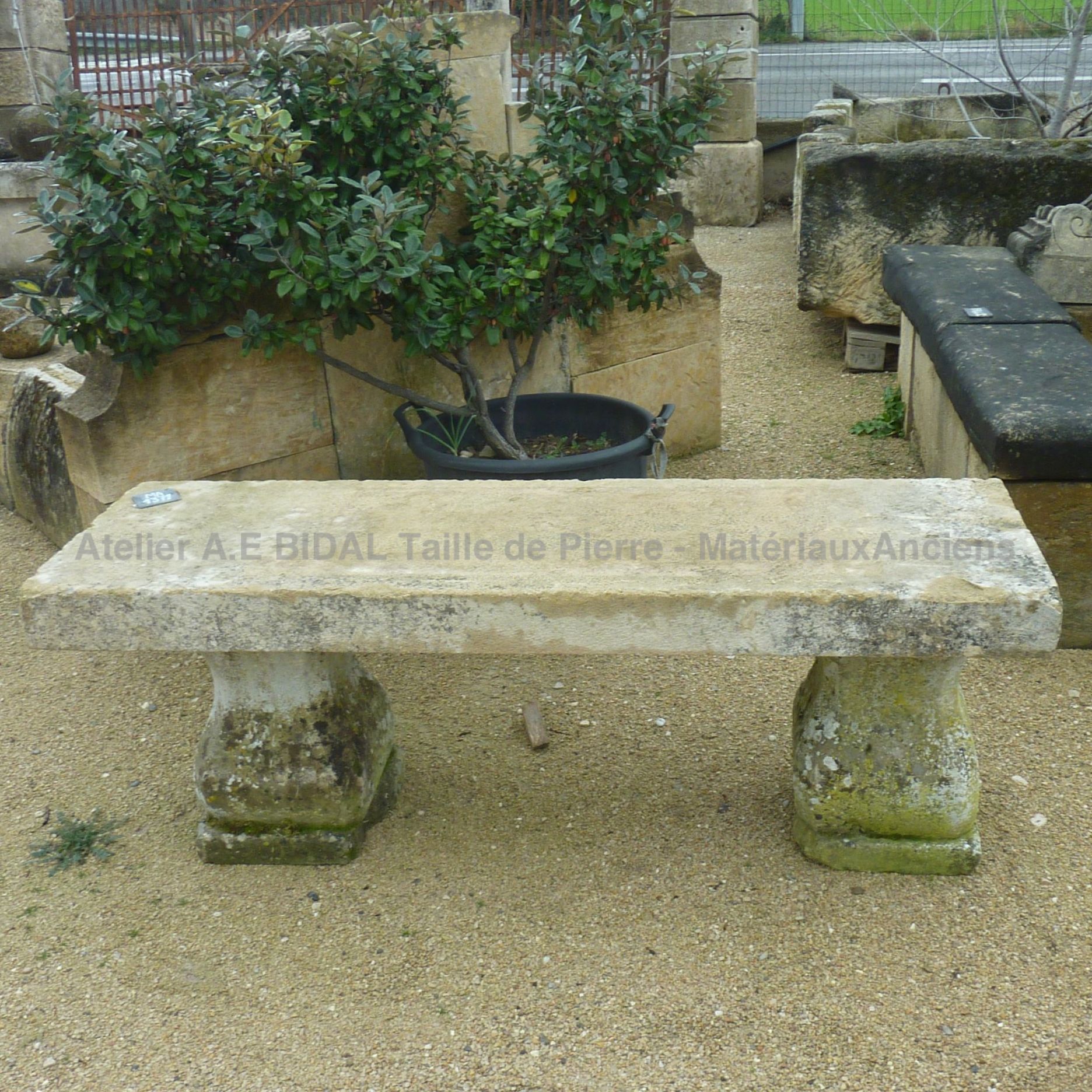 Antique rectangular stone bench with molded feet