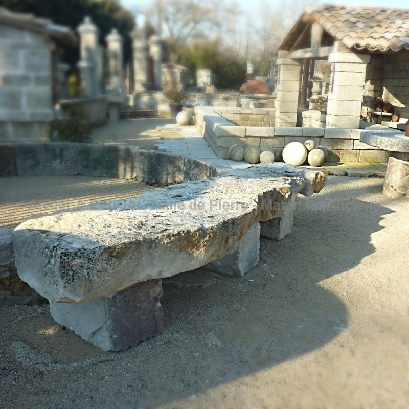 Ancient stone garden decoration | Long stone bench for sale at Alain Bidal in Provence