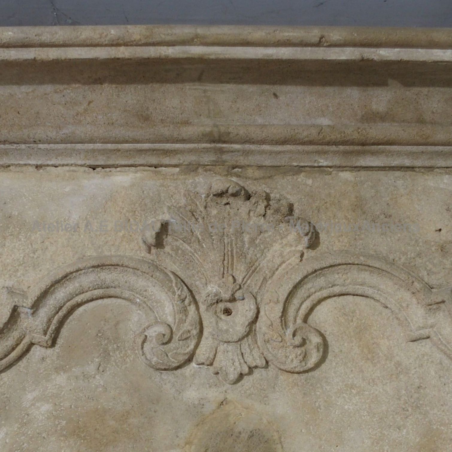 Simple decorative fireplace with overmantle.
