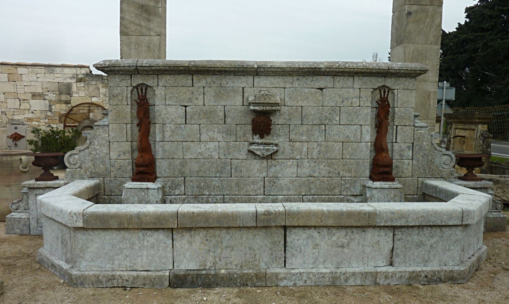 Large fountain with imposing pediment and large basin | Outdoor fountain of French craftmanship.