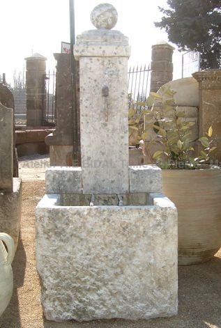 Nice white fountain - wall fountain terrace with column shaped pediment.