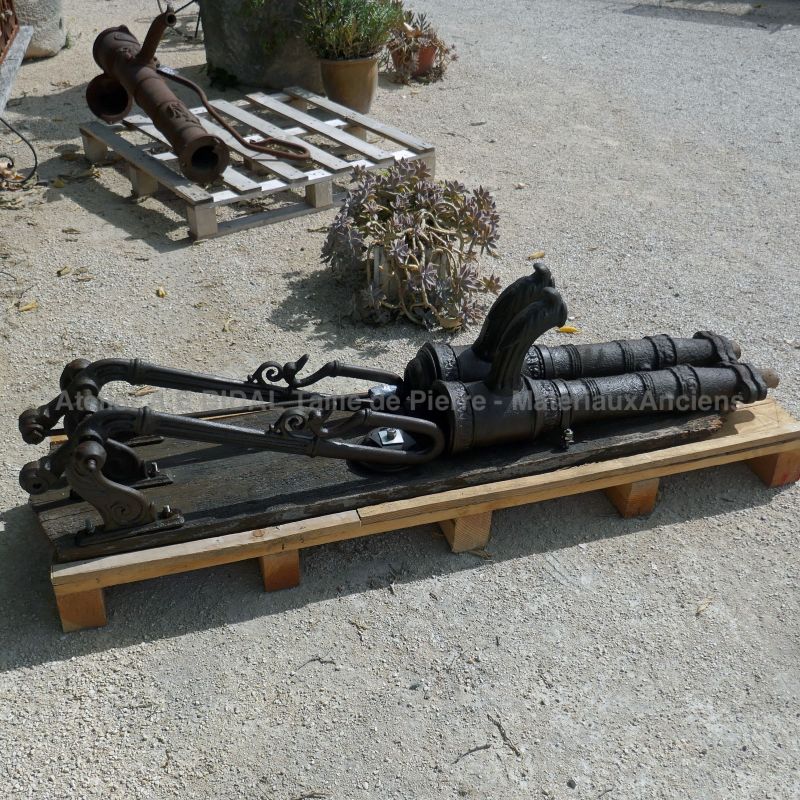 Rustic and original manual pump: an old cast iron water pump.