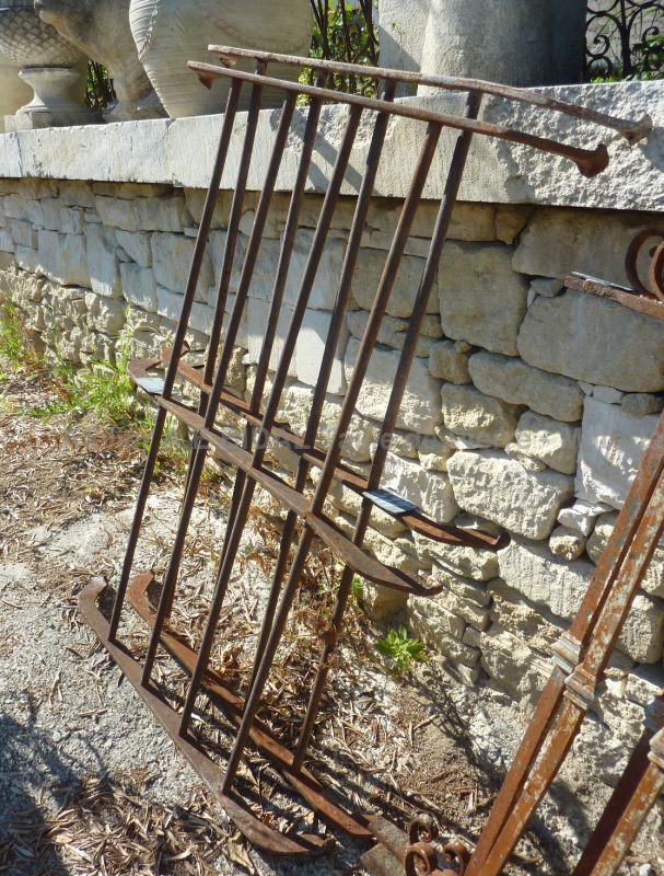 Old grid: wrought iron window grid sold in set of two.