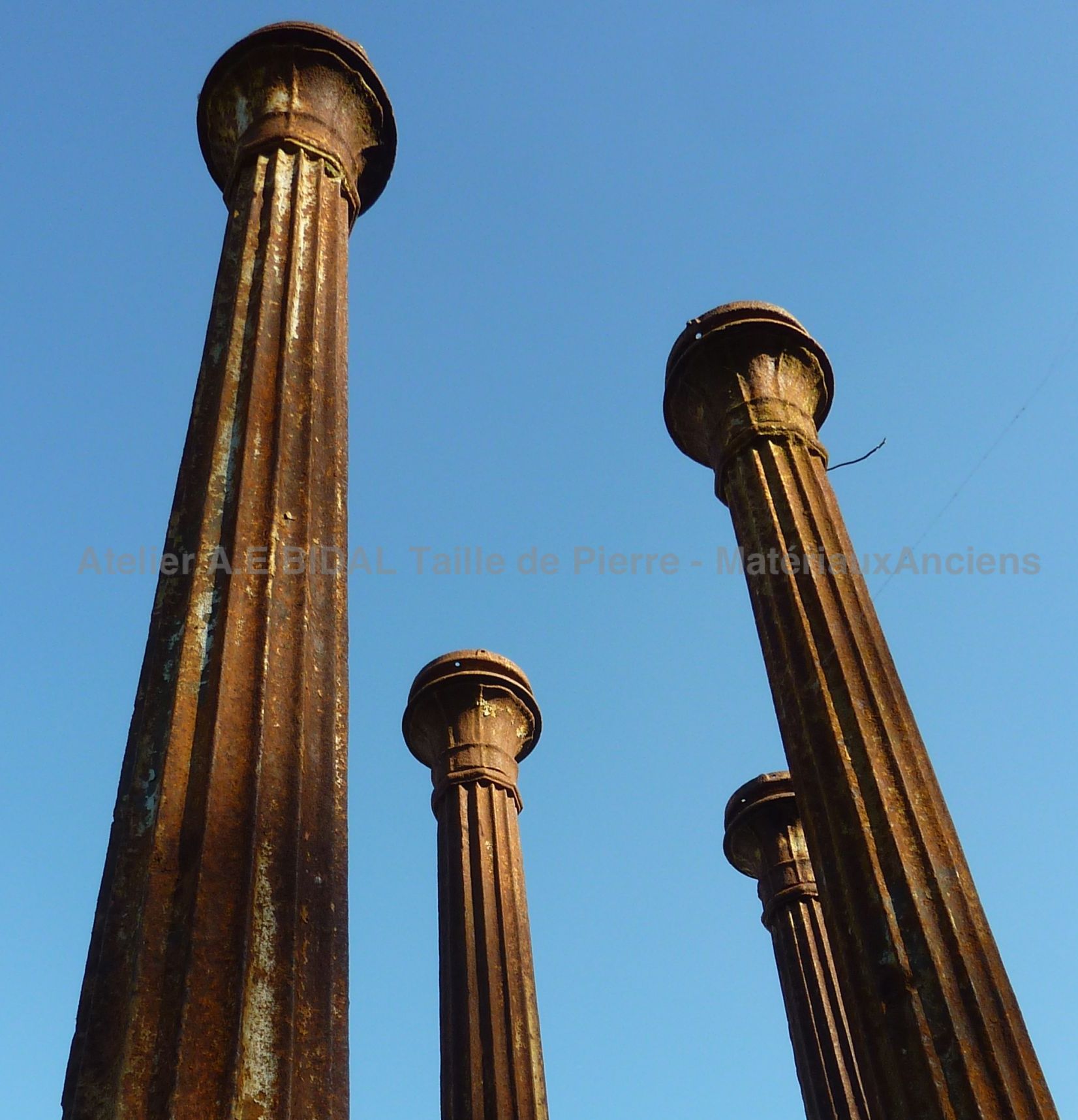 Top of an old pillar - Doric column made of cast iron (5 examples).