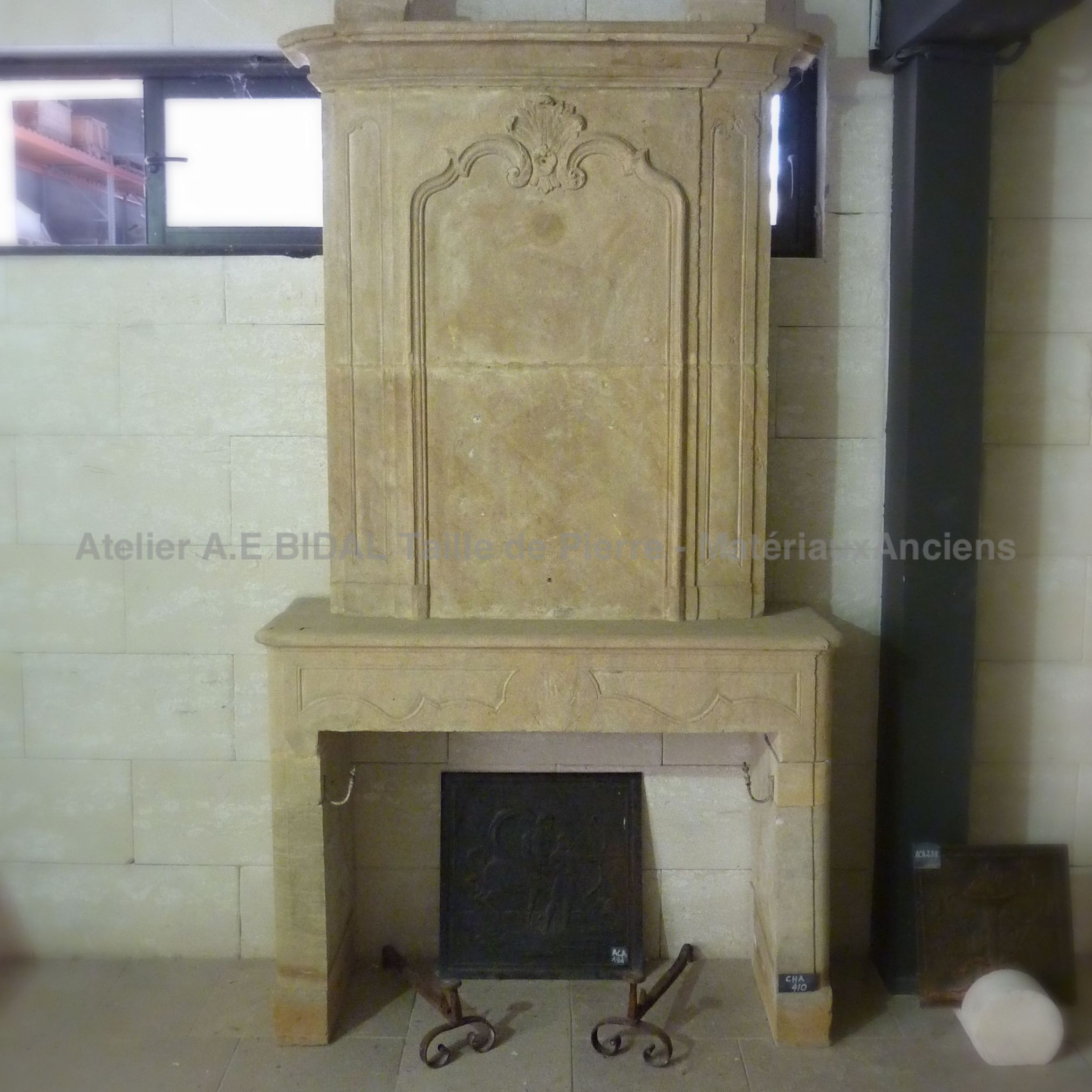 18th century fireplace with overmantle- an old fireplace recovered in a French monastery.