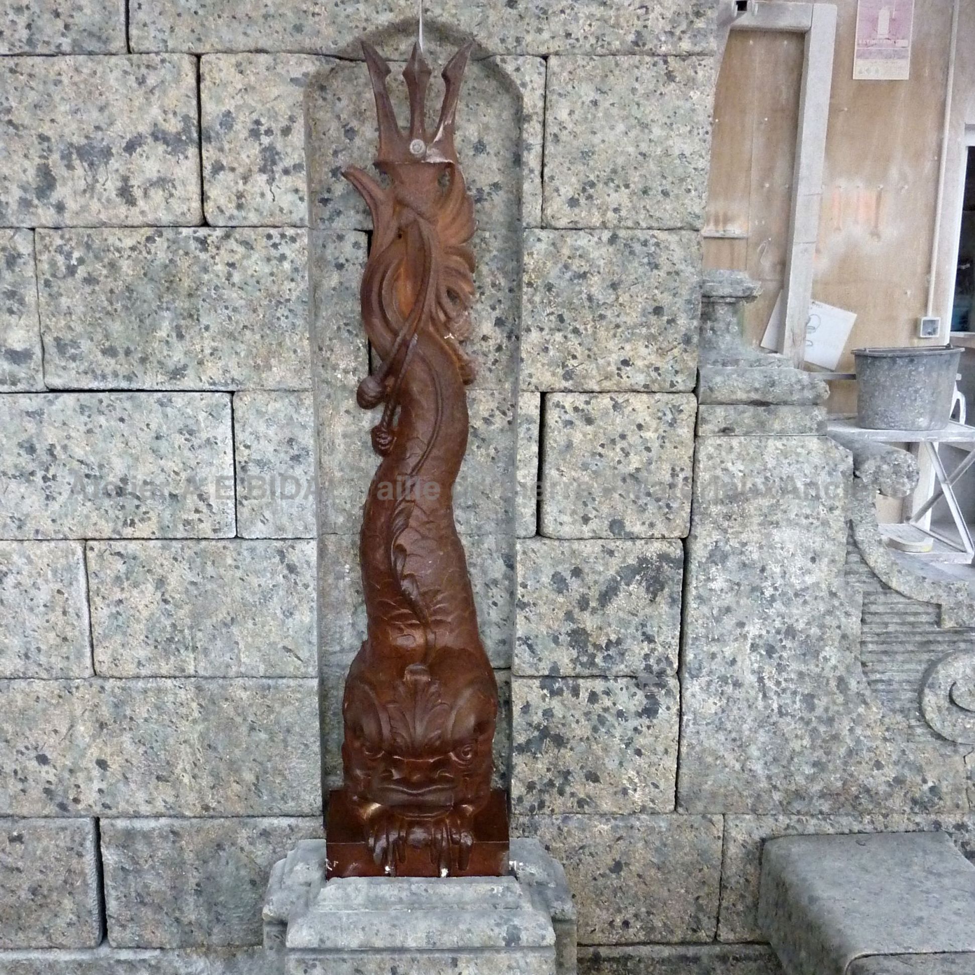 Cast element on our large handcrafted fountain made of Ouville stone.