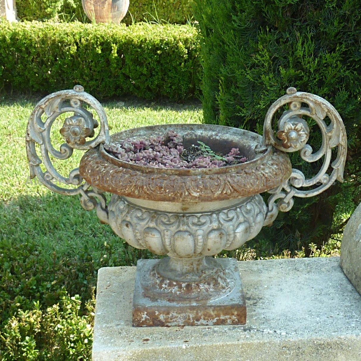 Antique vase with handles - an old Medici vase made of old cast iron.