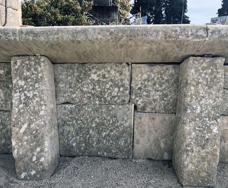 Wash-house in old and patinated stones by Alain Bidal antique materials in Provence