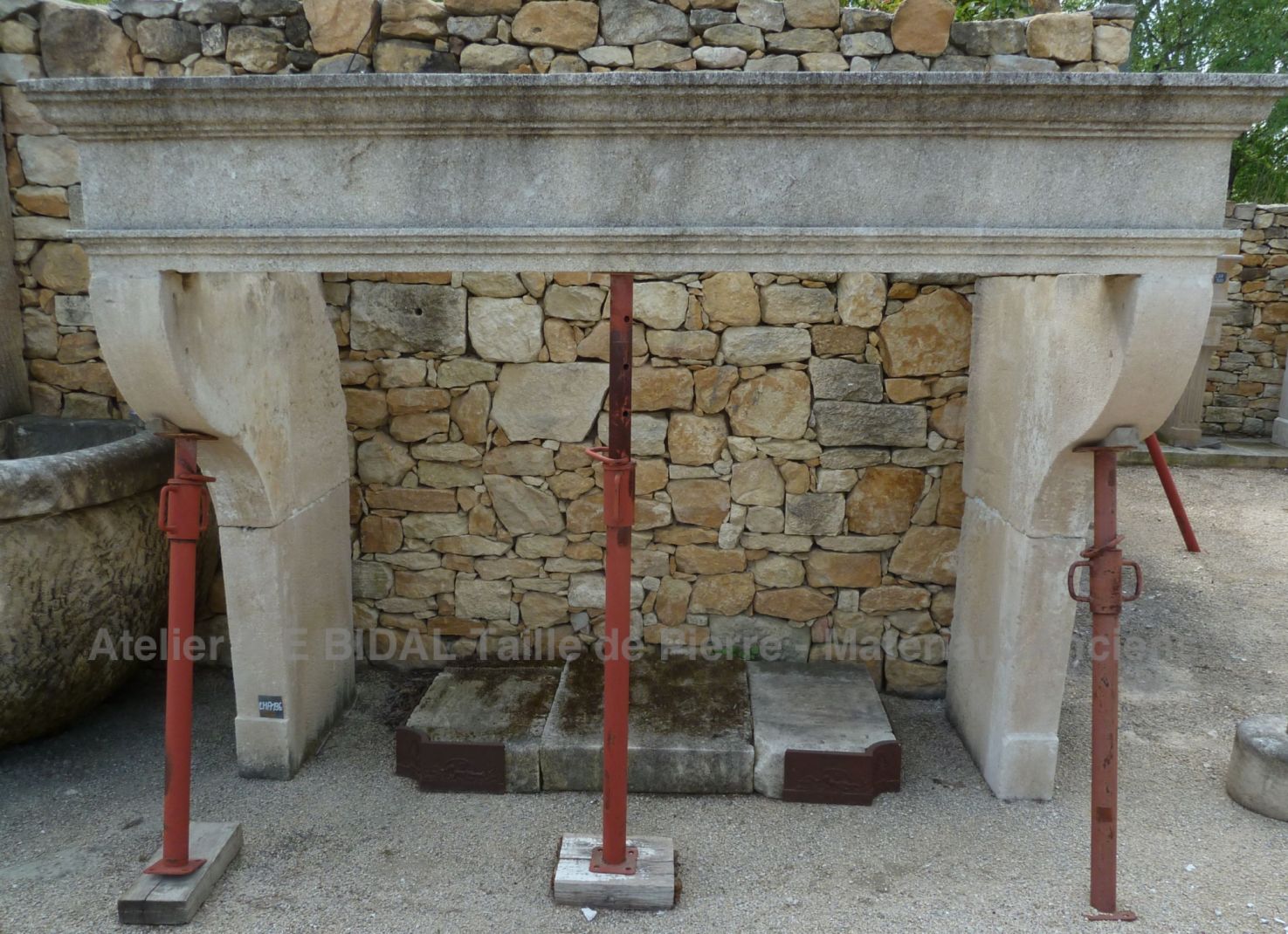 Louis 14 Fireplace - large stone fireplace.