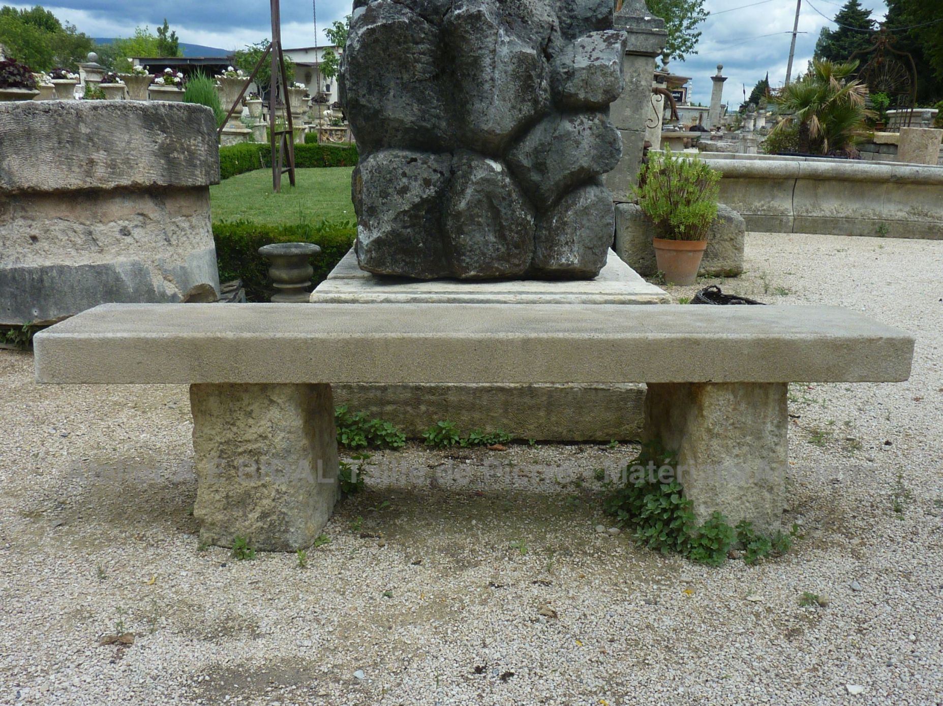 Large limestone bench with massive jambs - old garden furniture.